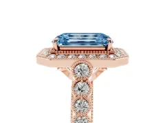 Fancy Blue Emerald Cut Diamond Milgrain Halo Solitaire Ring Set in Rose gold with Bezel Set Side Stones and Pavé Band