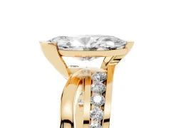 Marquise Cut Diamond Solitaire Ring Set in Yellow gold with Channel Set Split Shank and Tension Prongs