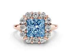 Fancy Blue Princess Cut Diamond Halo Cluster Engagement Ring Set in Rose gold with Polished Band and Prong Setting