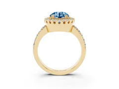 Fancy Blue Round Cut Diamond Halo Ring Set in Yellow gold with Pavé Shank and Prong Setting