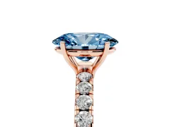 Fancy Blue Oval Cut Diamond Pavé Solitaire Engagement Ring Set in Rose gold with Prong Setting