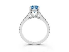 Fancy Blue Cushion Cut Diamond Solitaire Ring Set in Platinum with Brilliant Pavé Band and Prong Setting