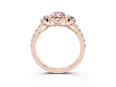 Fancy Pink Pear Cut Diamond Three-Stone Ring Set in Rose gold with Round Side Stones and Delicate Pavé Band