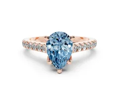 Fancy Blue Pear Cut Diamond Solitaire Ring Set in Rose gold with Brilliant Pavé Band and Prong Setting