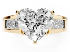 Heart Cut Diamond Solitaire Ring Set in Yellow gold with Channel-Set Accent Stones and Prong Setting