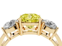 Fancy Yellow Cushion Cut Diamond Three-Stone Ring Set in Yellow gold with Round Side Stones and Classic Band