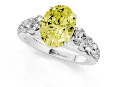 Fancy Yellow Oval Cut Diamond Solitaire Ring Set in Silver with Pavé-Set Band and Prong Setting