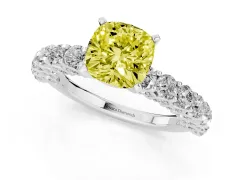 Fancy Yellow Cushion Cut Diamond Solitaire Ring Set in White gold with Shared Prong Pavé Band