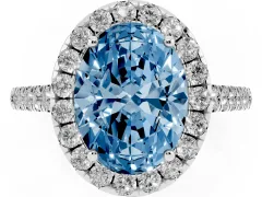 Fancy Blue Oval Cut Diamond Halo Pavé Engagement Ring Set in Platinum with Prong Setting