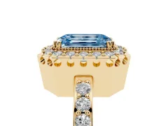 Fancy Blue Emerald Cut Diamond Halo Ring Set in Yellow gold with Pavé Shank and Prong Setting
