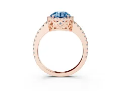 Fancy Blue Round Cut Diamond Halo Ring Set in Rose gold with Pavé Shoulders and Halo-Framed Center