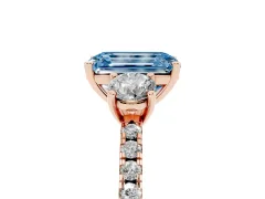 Fancy Blue Emerald Cut Diamond Three-Stone Ring Set in Rose gold with Pavé Band and Graduated Sides