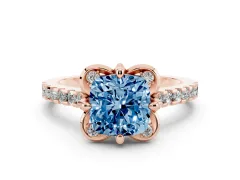 Fancy Blue Cushion Cut Diamond Solitaire Ring Set in Rose gold with Pavé Band and Floral Prong Setting