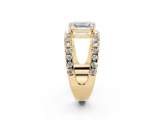Emerald Cut Diamond Split Shank Pavé Solitaire Ring Set in Yellow gold with Open Shank Design