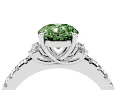 Fancy Green Oval Cut Diamond Three-Stone Pavé Ring Set in Platinum with Prong Setting