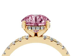 Fancy Pink Round Cut Diamond Pavé Solitaire Ring Set in Yellow gold with Round Band Accents and Prong Setting