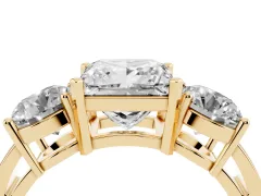 Princess Cut Diamond Three-Stone Ring Set in Yellow gold with Round Side Stones and Classic Band