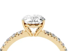 Oval Cut Diamond Pavé Solitaire Engagement Ring Set in Yellow gold with Prong Setting