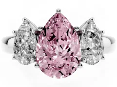 Fancy Pink Pear Cut Diamond Three-Stone Ring Set in Platinum with Bold Center and Classic Band