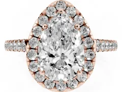 Pear Cut Diamond Halo Pavé Engagement Ring Set in Rose gold with Prong Setting