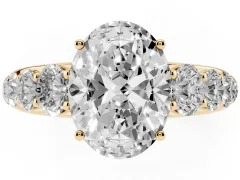 Oval Cut Diamond Solitaire Ring Set in Yellow gold with Pavé-Set Band and Prong Setting