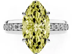 Fancy Yellow Marquise Cut Diamond Solitaire Ring Set in White gold with Channel Set Band and Prong Setting