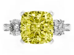 Fancy Yellow Cushion Cut Diamond Three-Stone Ring Set in Platinum with Pavé Band and Smaller Side Stones