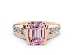 Fancy Pink Emerald Cut Diamond Bezel-Set Solitaire Ring Set in Rose gold with Channel-Set Band