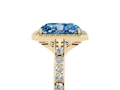 Fancy Blue Radiant Cut Diamond Halo Engagement Ring Set in Yellow gold with Round Pavé Shoulders and Heart Gallery