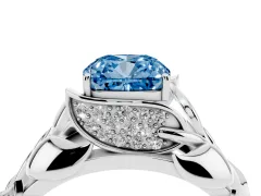 Fancy Blue Cushion Cut Diamond Leaf-Inspired Engagement Ring Set in White gold with Round Accents