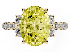 Fancy Yellow Oval Cut Diamond Three-Stone Pavé Ring Set in Yellow gold with Prong Setting