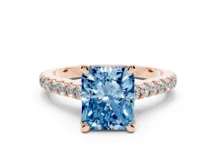 Fancy Blue Radiant Cut Diamond Solitaire Ring Set in Rose gold with Brilliant Pavé Band and Prong Setting