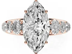 Marquise Cut Diamond Solitaire Ring Set in Rose gold with Pavé-Set Band and Prong Setting