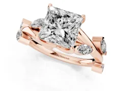 Princess Cut Diamond Solitaire Ring Set in Rose gold with Twisted Marquise Accent Band