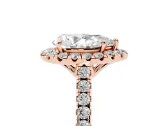 Pear Cut Diamond Pavé Halo Engagement Ring Set in Rose gold with Pavé Band and Prong Setting