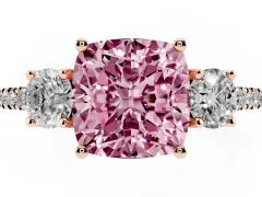 Fancy Pink Cushion Cut Diamond Three-Stone Ring Set in Rose gold with Pavé Band and Graduated Sides