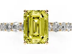 Fancy Yellow Emerald Cut Diamond Solitaire Ring Set in Yellow gold with Shared Prong Pavé Band