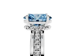 Fancy Blue Oval Cut Diamond Solitaire Ring Set in White gold with Channel Set Band and Prong Setting
