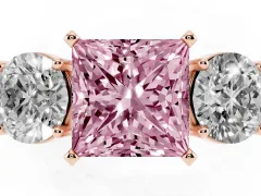 Fancy Pink Princess Cut Diamond Three-Stone Ring Set in Rose gold with Round Side Stones and Classic Band