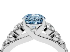 Fancy Blue Oval Cut Diamond Solitaire Ring Set in Silver with Pavé-Set Band and Prong Setting
