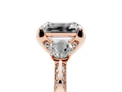 Fancy Pink Emerald Cut Diamond Three-Stone Ring Set in Rose gold with Pavé Band and Smaller Side Stones