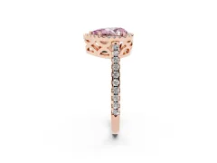 Fancy Pink Pear Cut Diamond Halo Ring Set in Rose gold with Pavé Shoulders and Halo-Framed Center