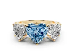 Fancy Blue Heart Cut Diamond Three-Stone Ring Set in Yellow gold with Textured Band
