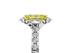 Fancy Yellow Emerald Cut Diamond Solitaire Ring Set in White gold with Pavé Band and Floral Prong Setting