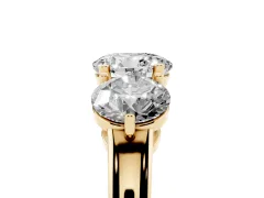 Round Cut Diamond Three-Stone Ring Set in Yellow gold with Prong Setting and Plain Band