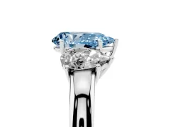 Fancy Blue Pear Cut Diamond Three-Stone Ring Set in White gold with Bold Center and Classic Band