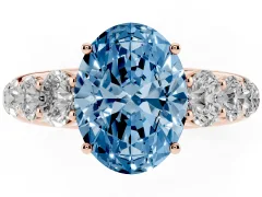 Fancy Blue Oval Cut Diamond Solitaire Ring Set in Rose gold with Pavé-Set Band and Prong Setting