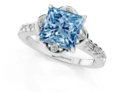 Fancy Blue Princess Cut Diamond Solitaire Ring Set in Silver with Pavé Band and Floral Prong Setting