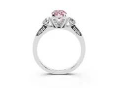 Fancy Pink Pear Cut Diamond Three-Stone Ring Set in Platinum with Pavé Band and Smaller Side Stones
