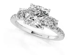 Cushion Cut Diamond Three-Stone Ring Set in White gold with Pavé Band and Graduated Sides